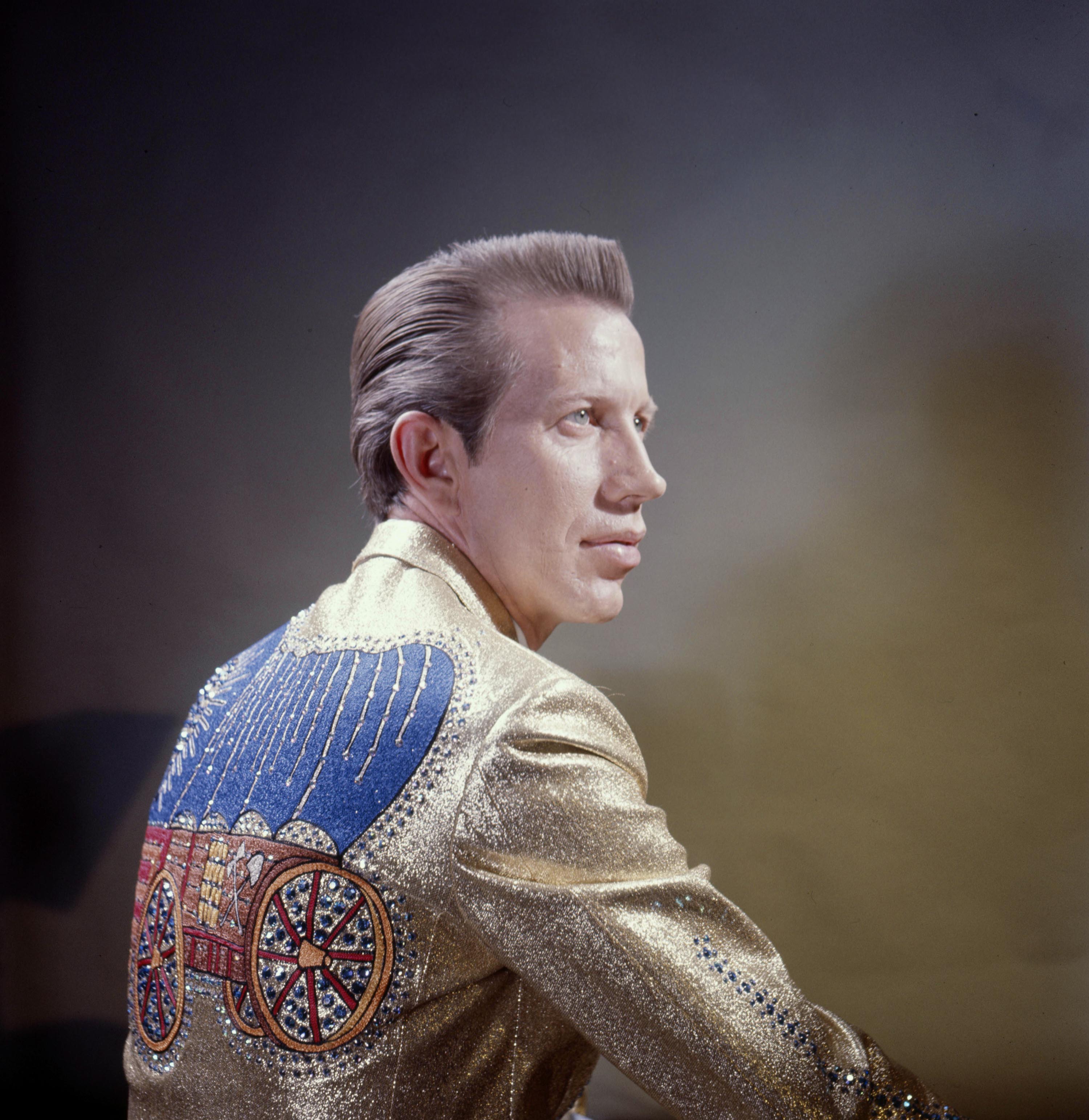 Leverett_Portrait w Nudie Wagon suit back copy.jpg